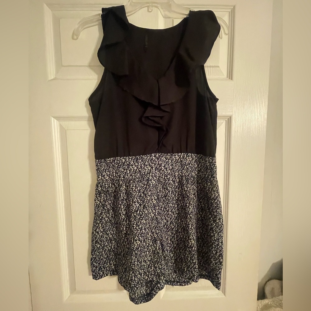 Black v neck romper with floral shorts